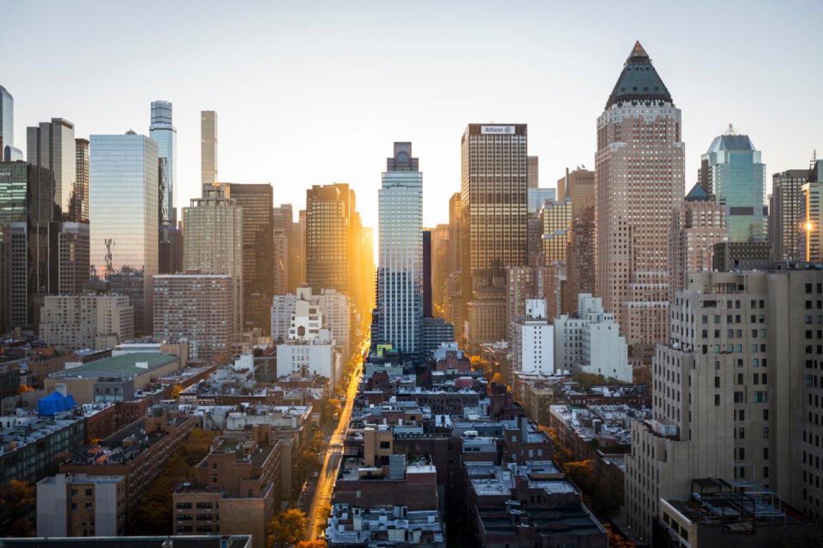 A city skyline at sunrise