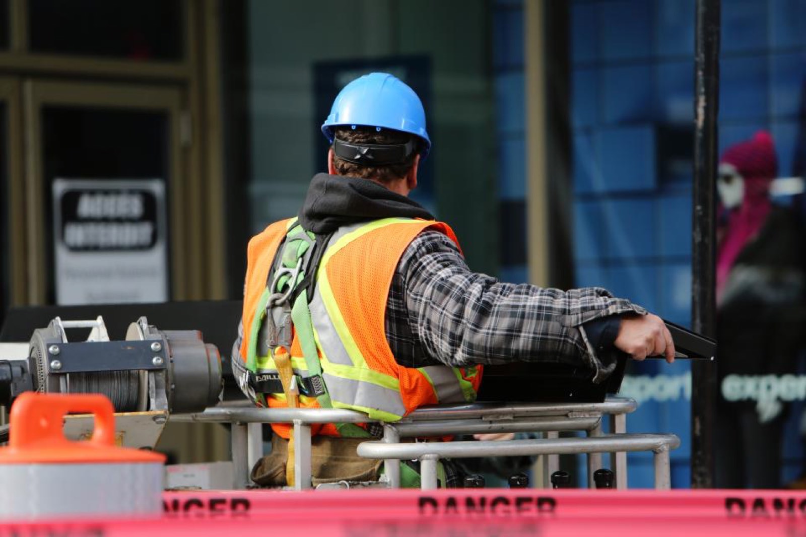 A construction worker in a hi-vis vest