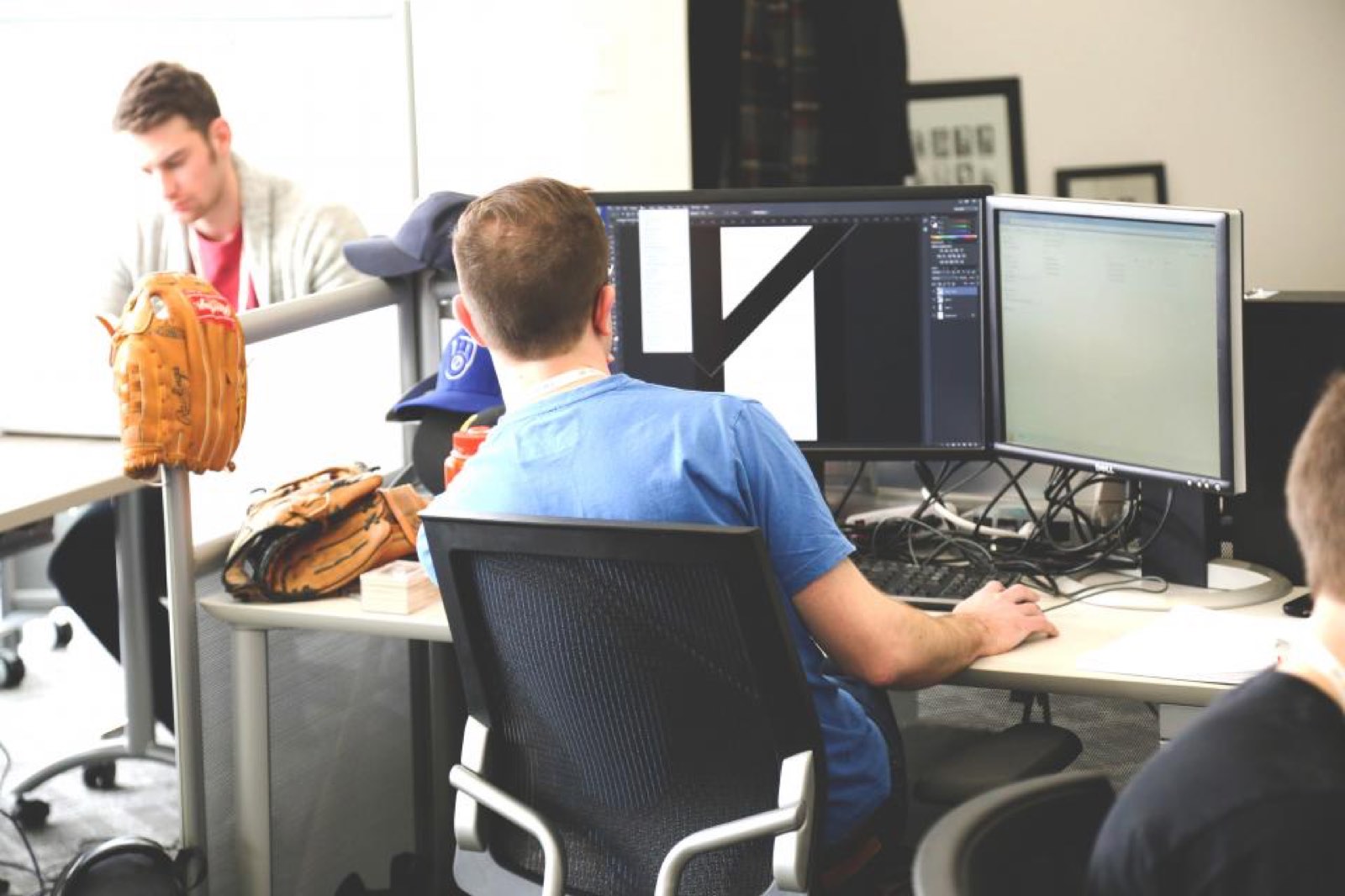 People working at desks in an office